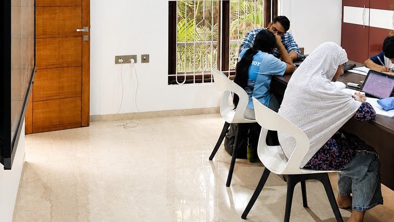 Swastik teaching maths to a small batch of students